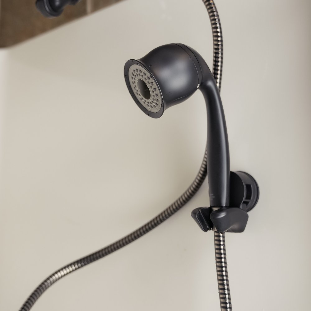 ShowerMe® Handheld Shower Head Black Matte mounted on shower wall