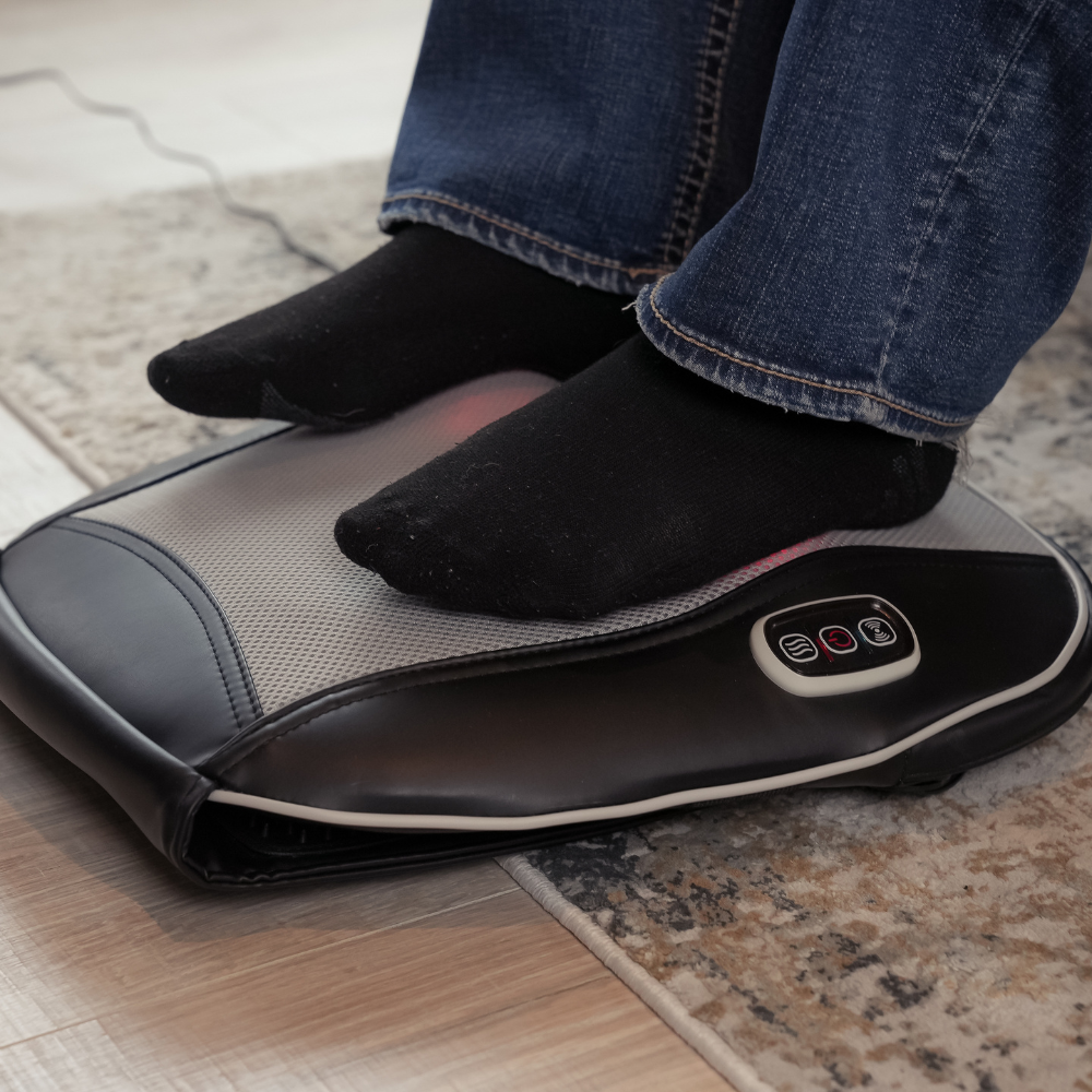 Man's feet on the BACKPlus® Shiatsu Back and Foot Massager