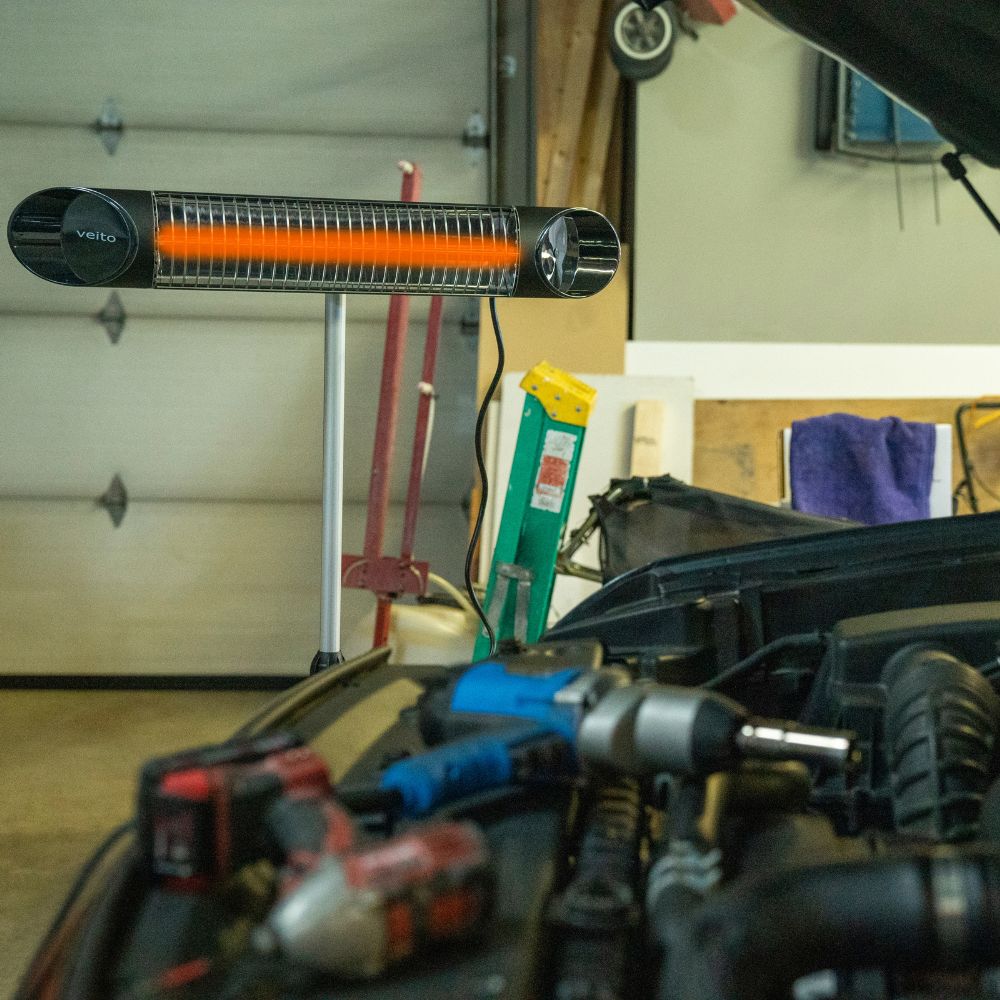 Veito Blade in black on stand with car motor in the foreground
