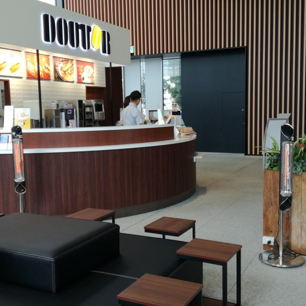 iQ Heat® Wave infrared heater in the corner of a cafe.