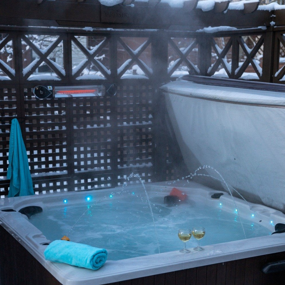 iQ Heat Wave Heater mounted outside by a hot tub