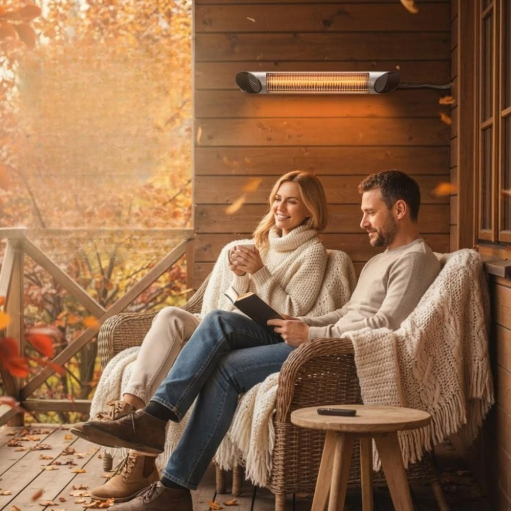 Veito Blade Heater mounted on a wall of a patio with a couple relaxing nearby