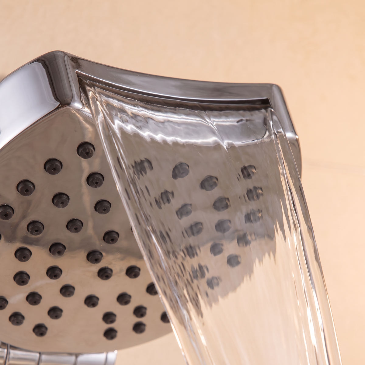 AquaJet Showerhead waterfall spray pouring from the slot in the curved end