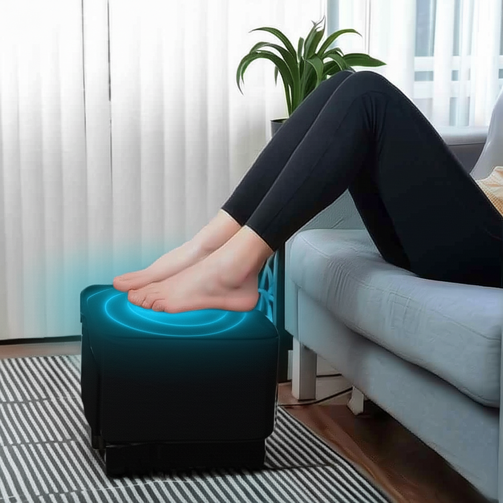Person using the BACKplus Ottoman Massager as a foot rest